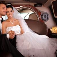 Bride & groom inside limo